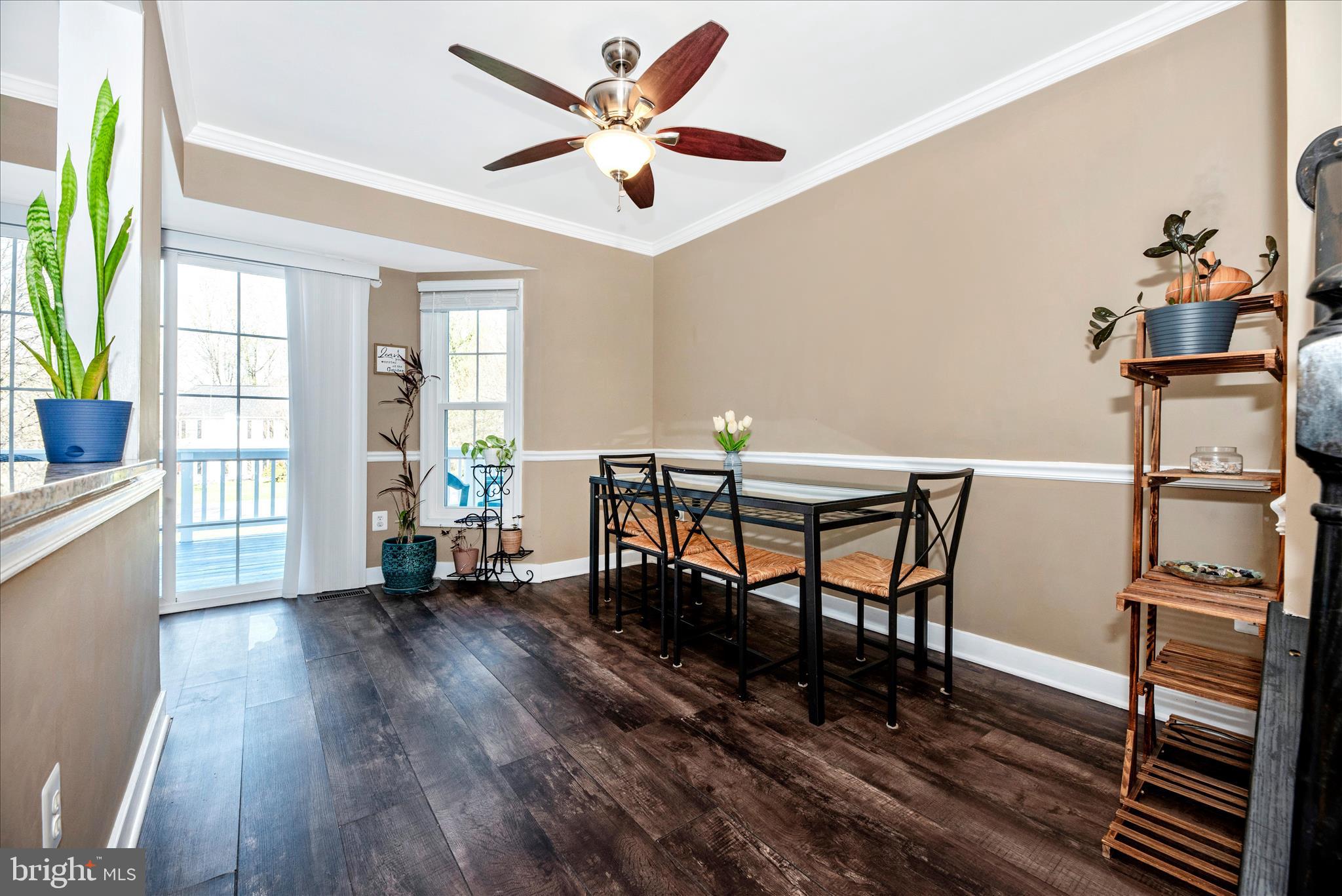 6630 Commodore Court New Market, MD 21774 - Photo 8 of 68 a workspace with furniture window and wooden floor