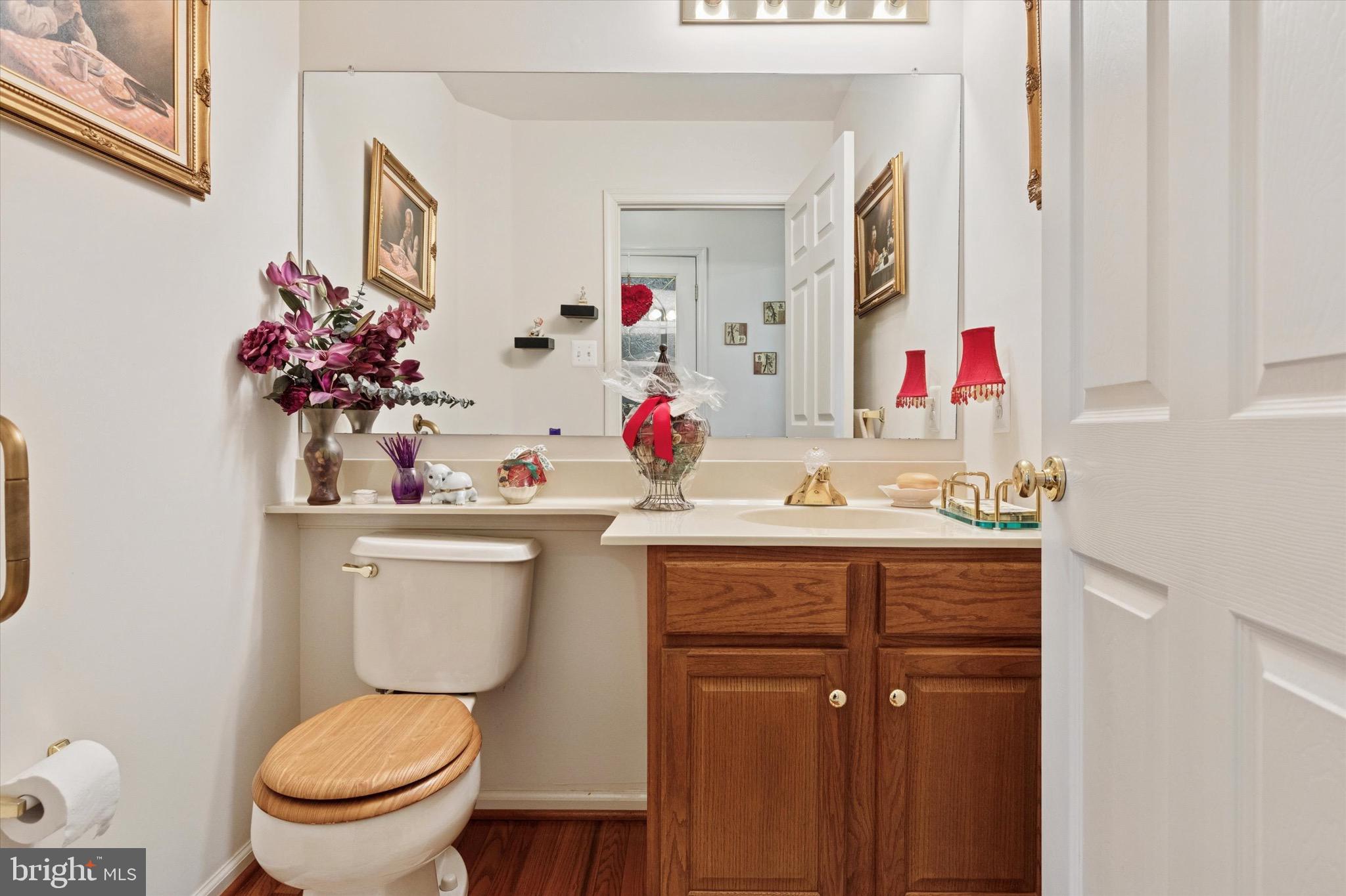 3821 Nanlyn Farm Circle Doylestown, PA 18902 - Photo 14 of 24 a bathroom with a sink vanity mirror and toilet