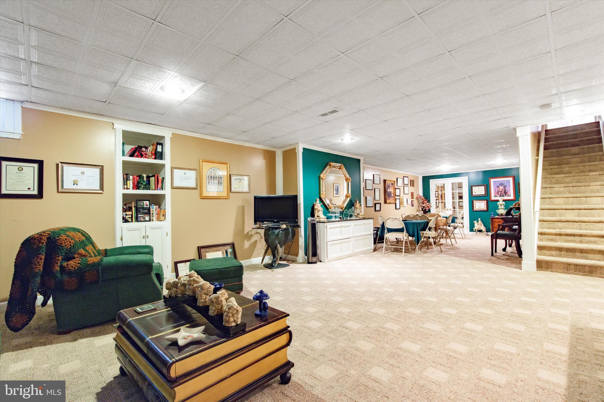 3821 Nanlyn Farm Circle Doylestown, PA 18902 - Photo 16 of 24 a living room with furniture and a flat screen tv