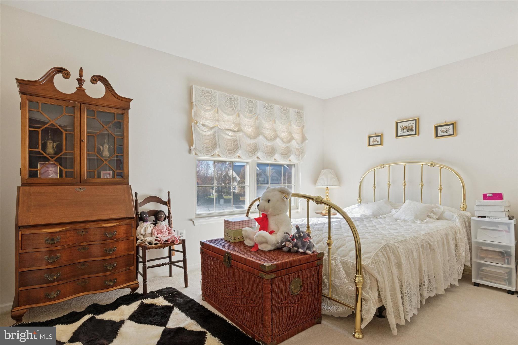 3821 Nanlyn Farm Circle Doylestown, PA 18902 - Photo 9 of 24 a bed room with a bed and a baby crib