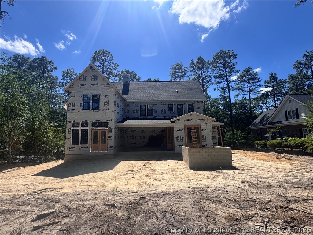 45 Beckett Ridge Pinehurst, NC 28374 - Photo 27 of 50 a front view of a house with a yard