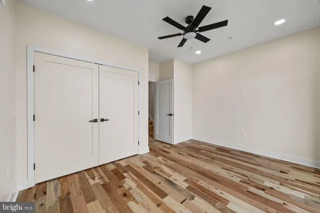 a view of a livingroom with a ceiling fan