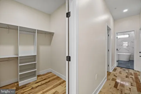 a view of an empty walk in closet