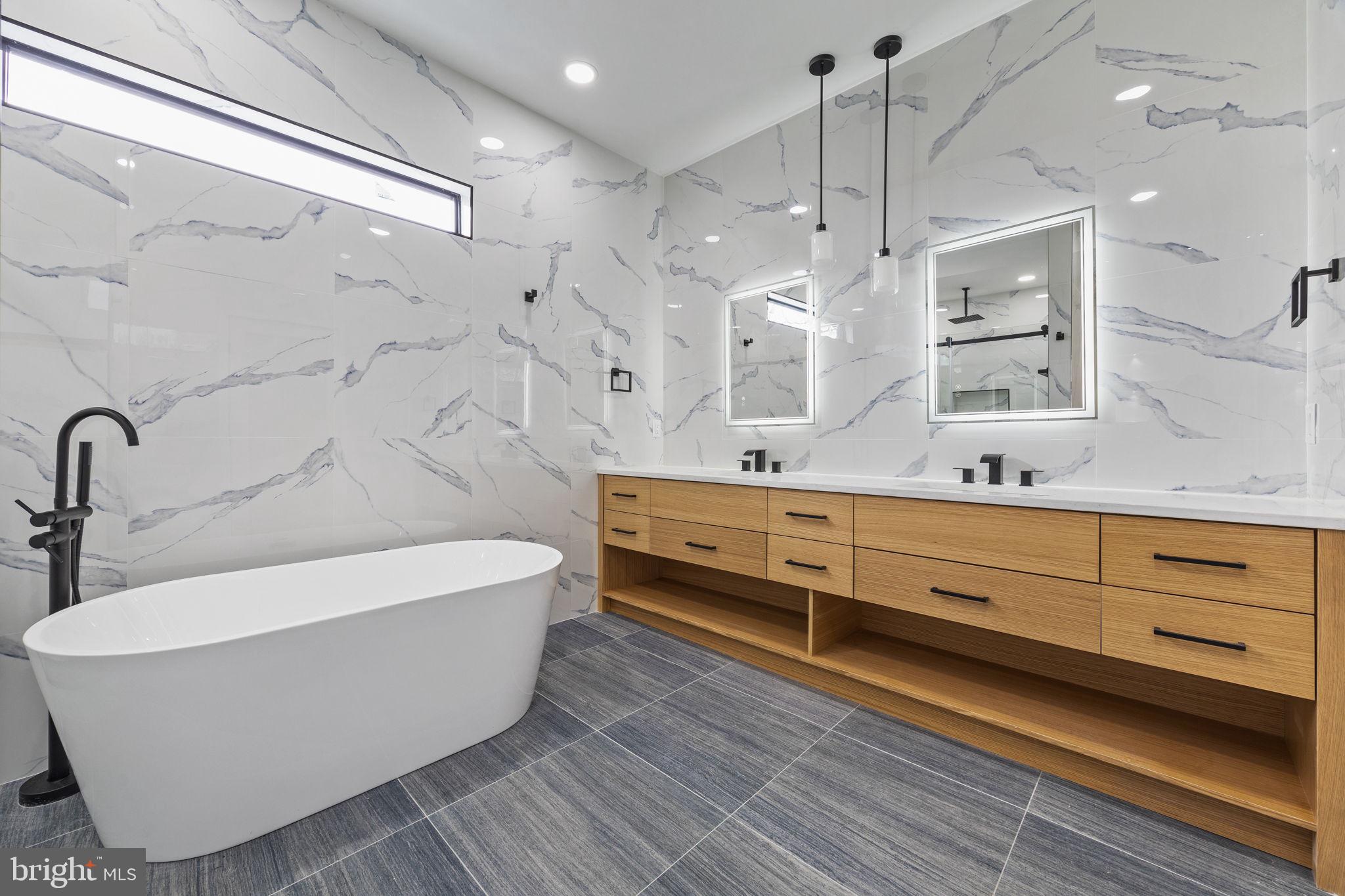 274 South Frazier Street Philadelphia, PA 19139 - Photo 24 of 34 a view of a bathtub in a bathroom