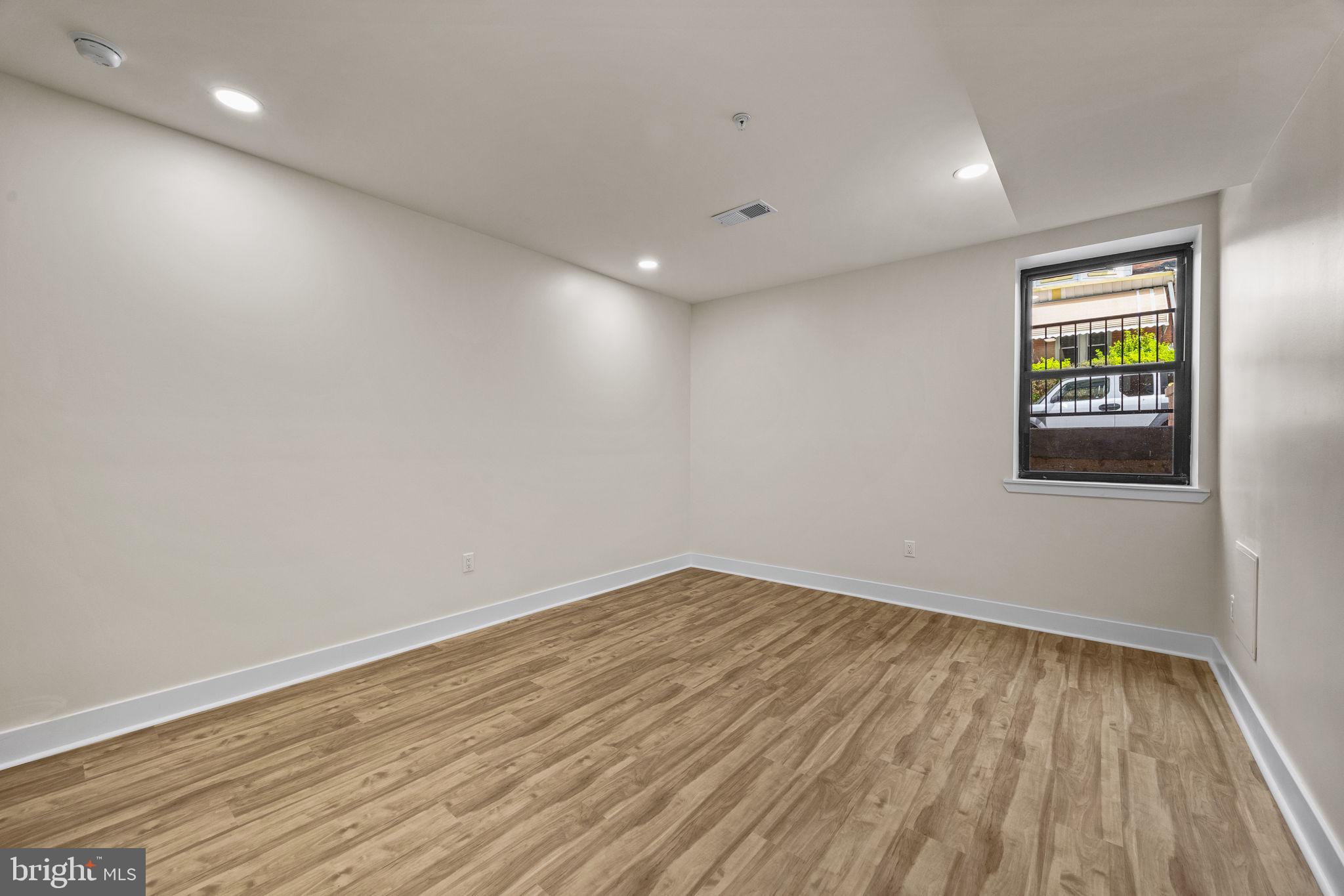 274 South Frazier Street Philadelphia, PA 19139 - Photo 29 of 34 a view of empty room with wooden floor and fan