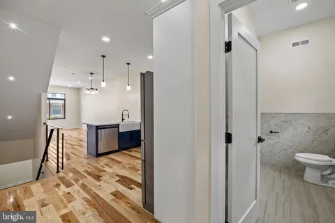 a spacious bathroom with a bathtub and a shower