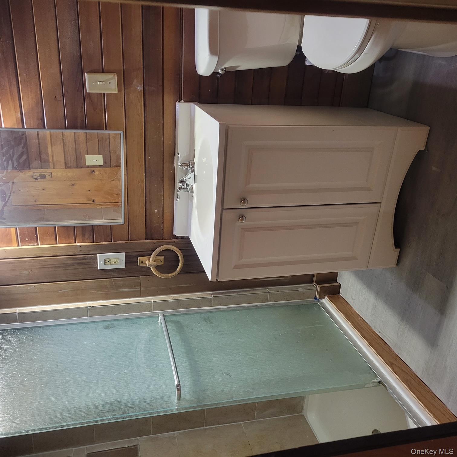 5 Elm Street Middletown, NY 10940 - Photo 2 of 7 a bathroom with a sink toilet and shower