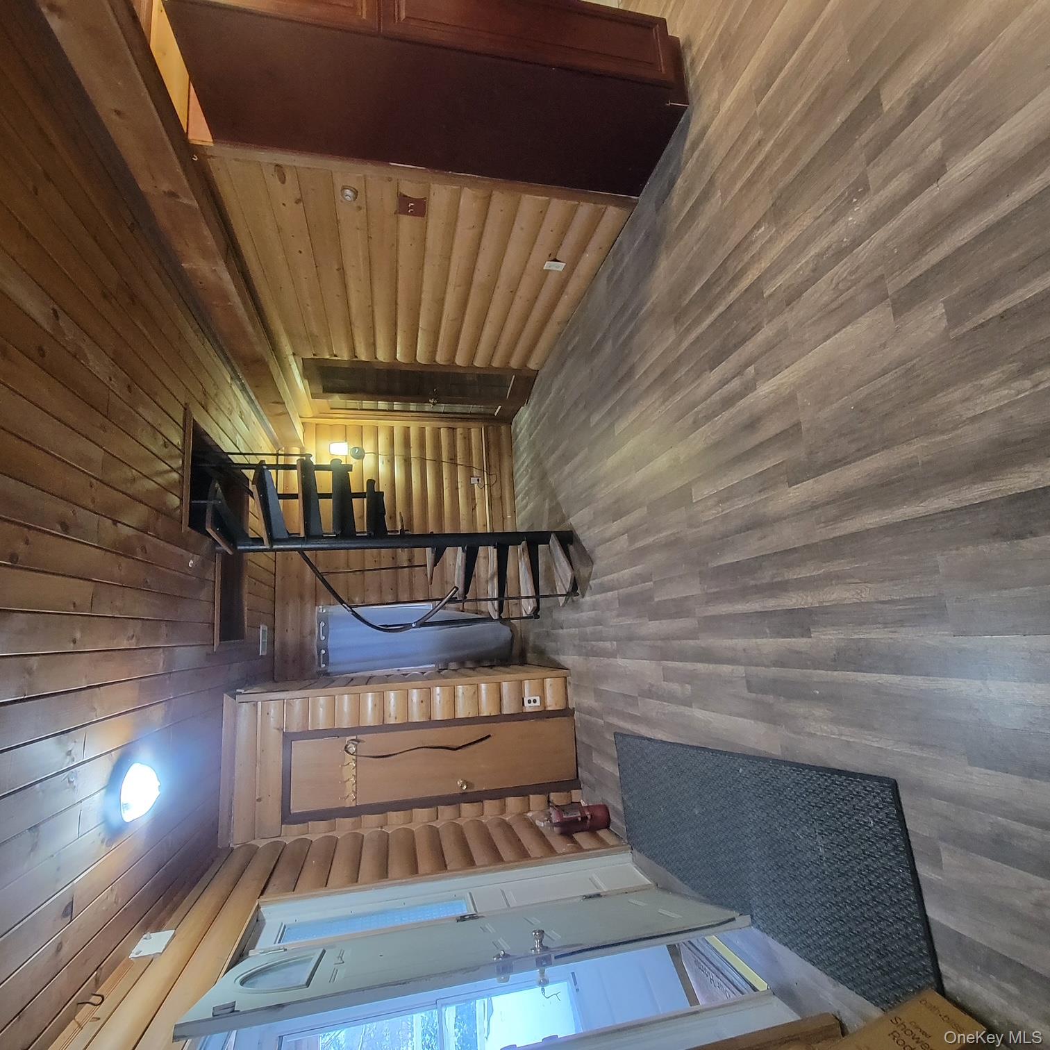 5 Elm Street Middletown, NY 10940 - Photo 4 of 7 a view of an empty room with wooden floor