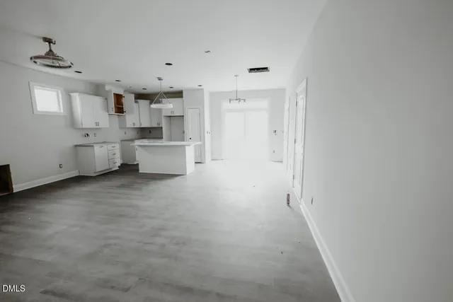 a large white room with a white walls