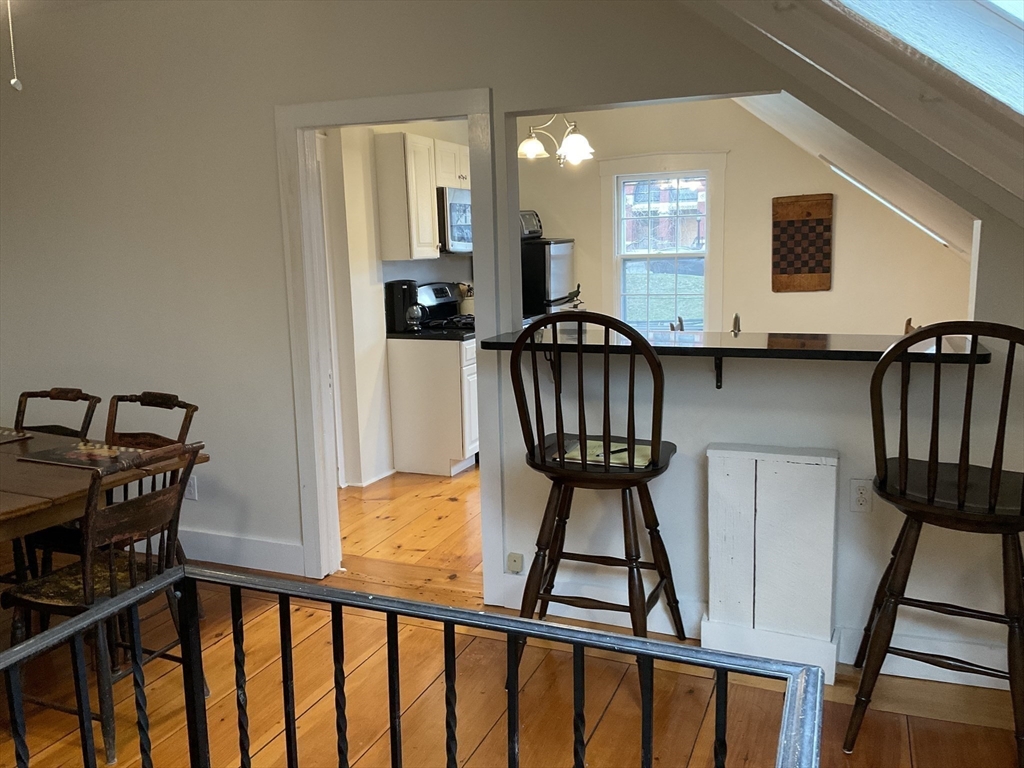 1 Middle Street, Unit 3 Marblehead, MA 01945 - Photo 5 of 16 a view of an entryway with a workspace