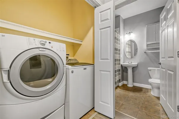 a bathroom with a toilet and a sink