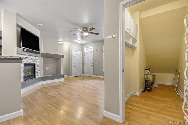 a view of a livingroom with furniture and a flat screen tv