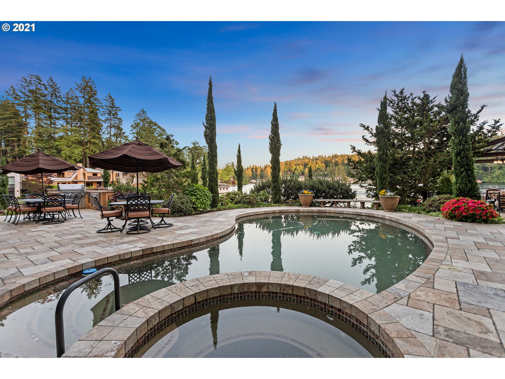 1226 Northshore Road Lake Oswego, OR 97034 - Photo 2 of 32 a view of swimming pool with outdoor seating and plants