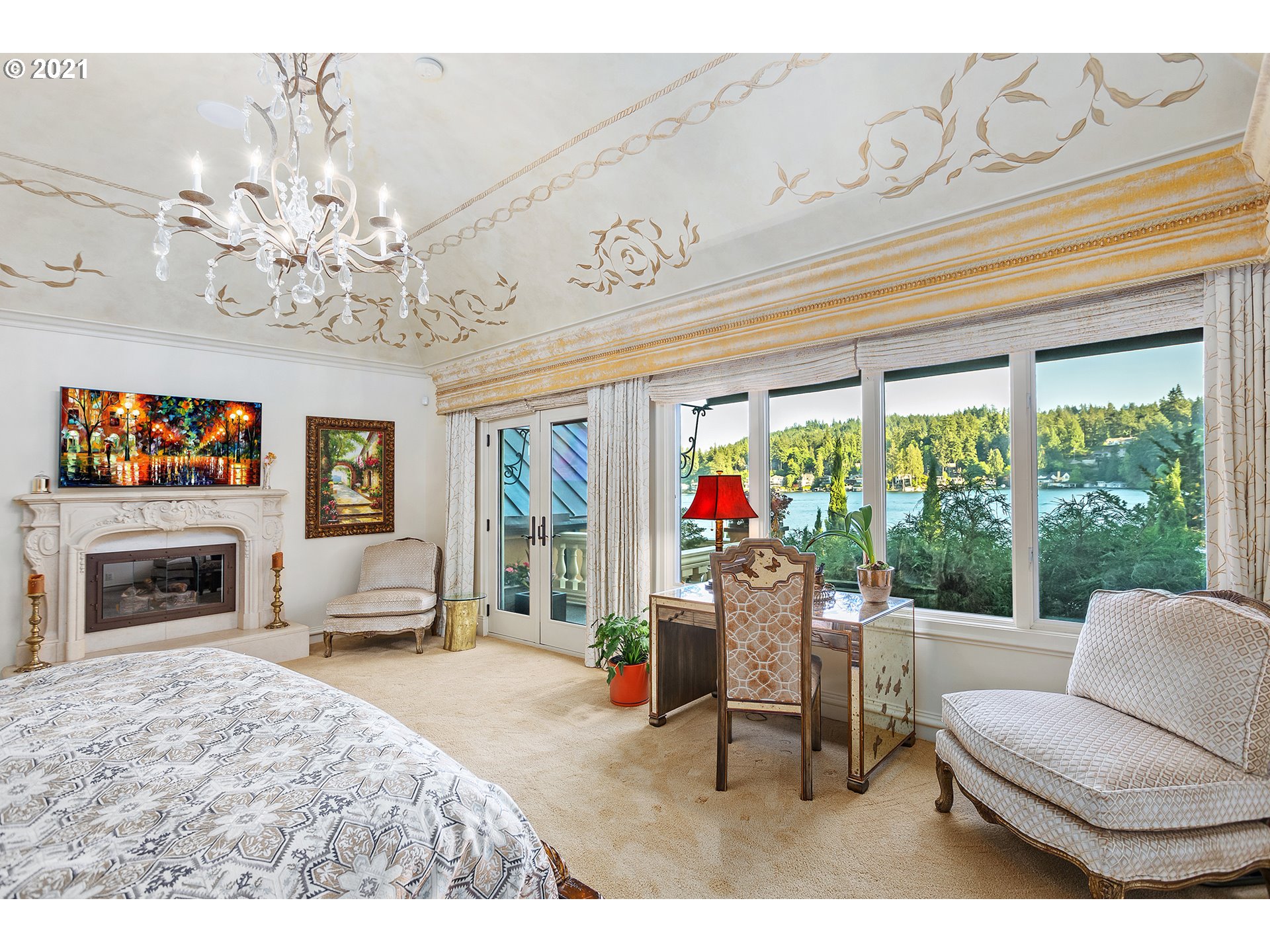 1226 Northshore Road Lake Oswego, OR 97034 - Photo 11 of 32 a living room with furniture a fireplace and a chandelier