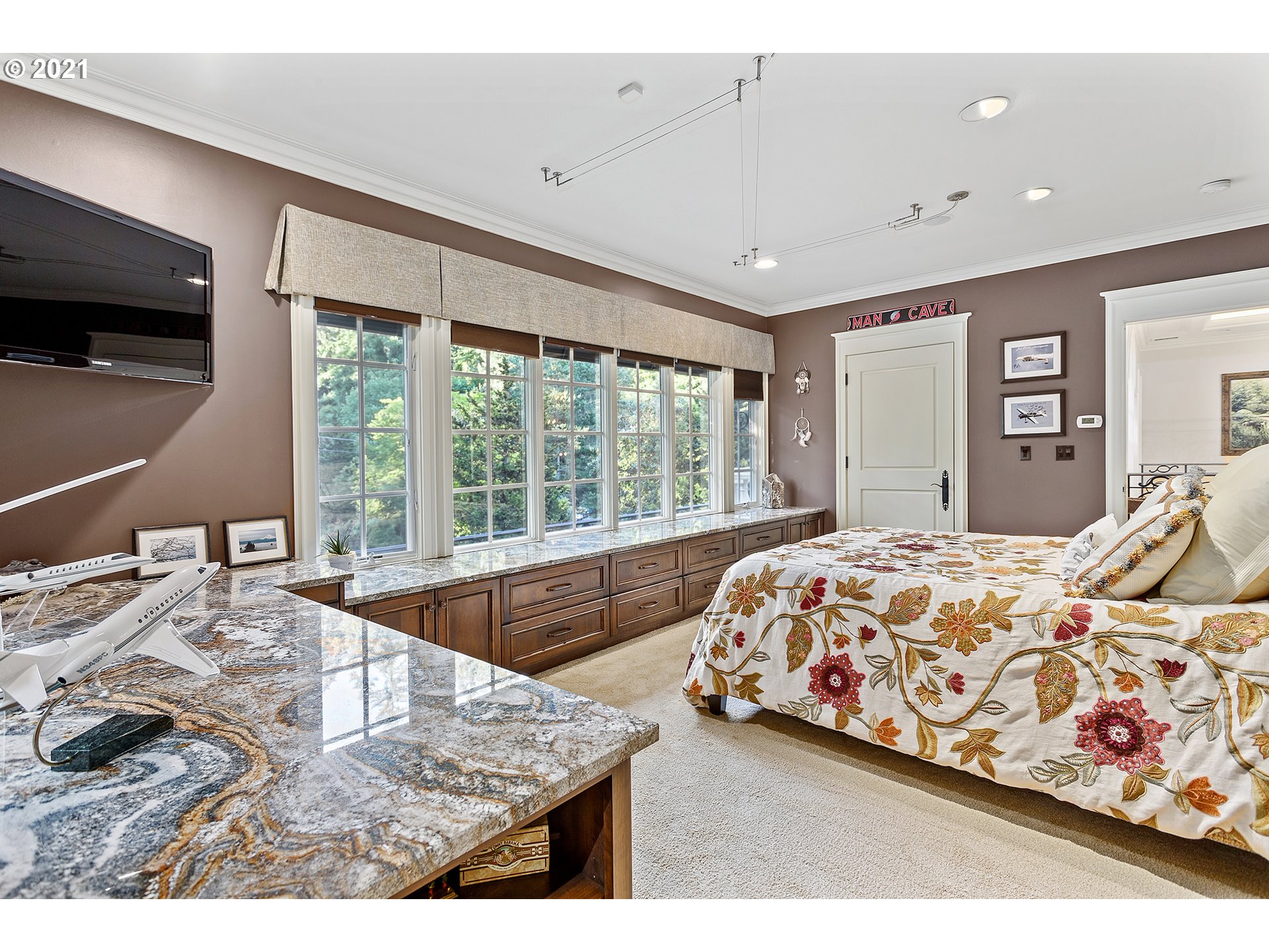 1226 Northshore Road Lake Oswego, OR 97034 - Photo 14 of 32 a bedroom with a bed and glass window