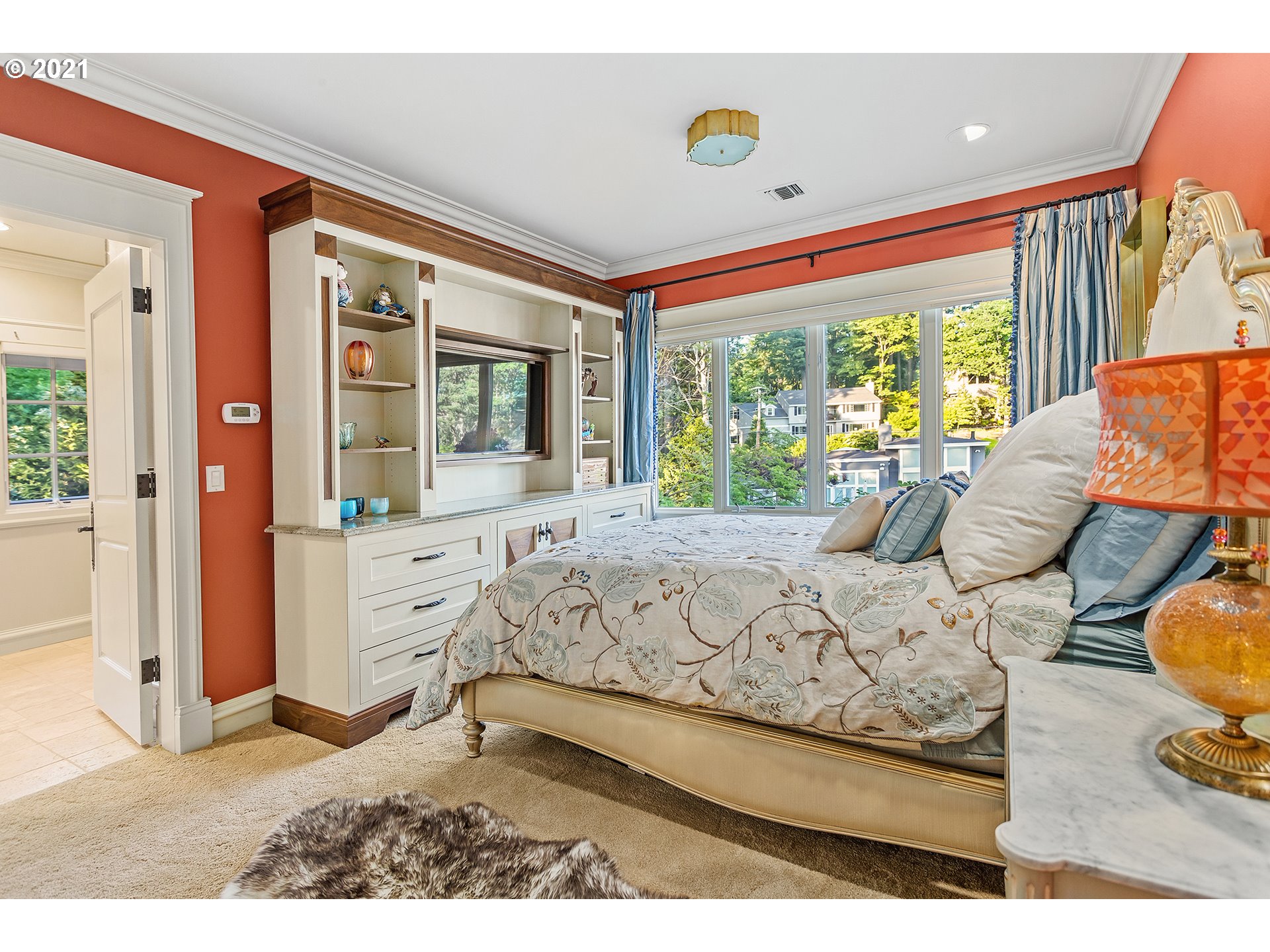 1226 Northshore Road Lake Oswego, OR 97034 - Photo 16 of 32 a bed room with a bed and a large window