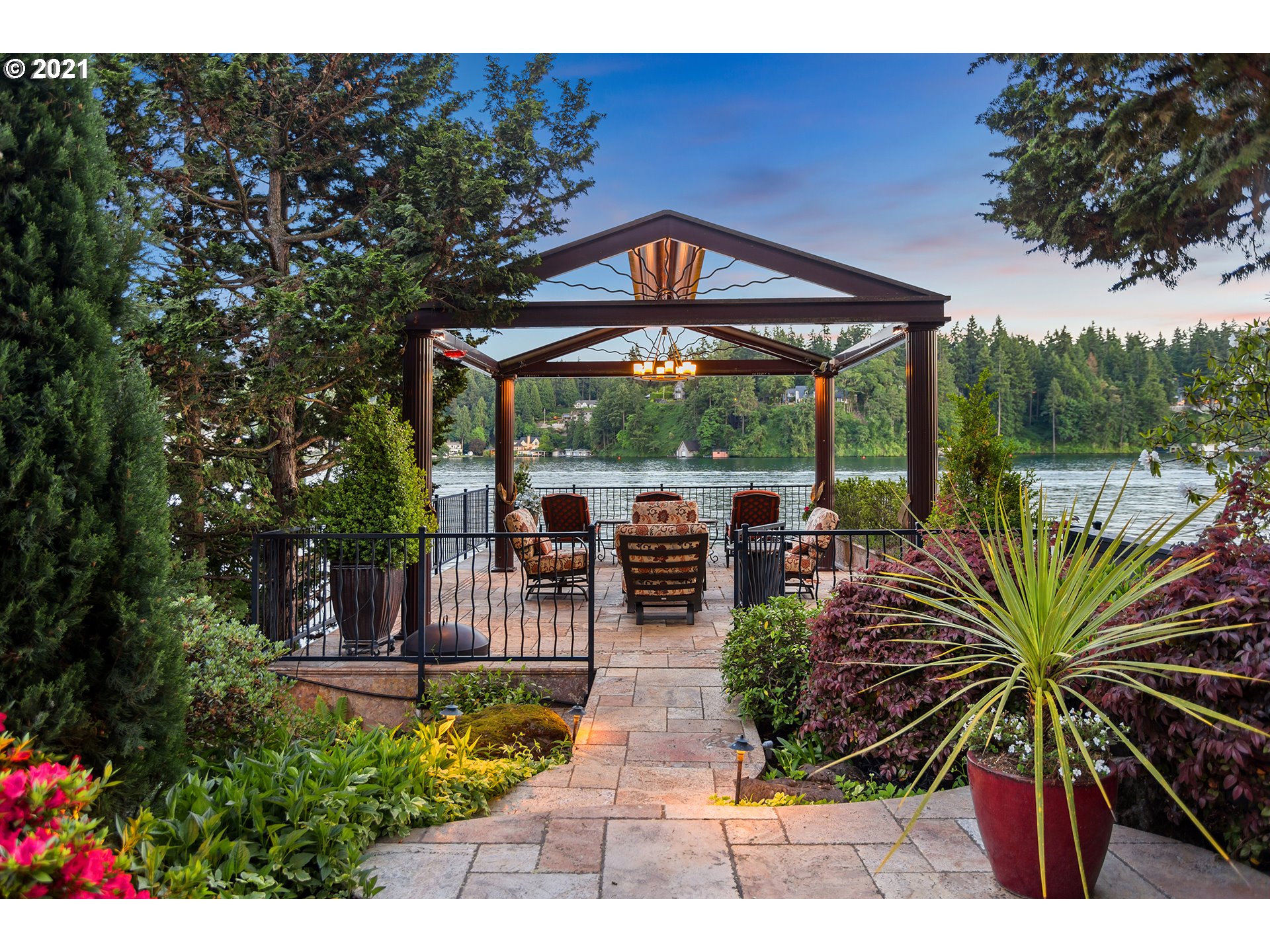 1226 Northshore Road Lake Oswego, OR 97034 - Photo 17 of 32 a view of a swimming pool with chairs in patio
