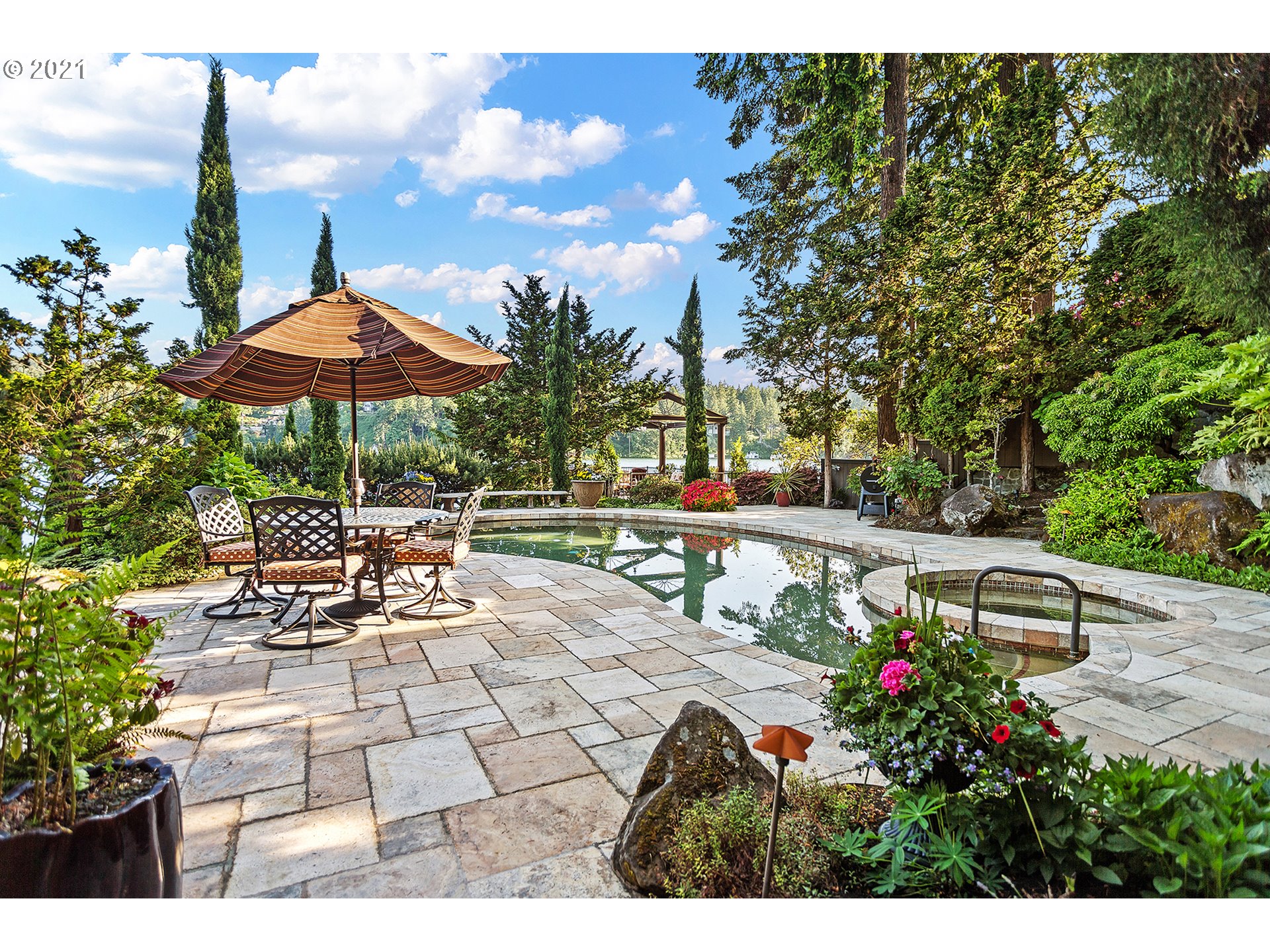 1226 Northshore Road Lake Oswego, OR 97034 - Photo 19 of 32 a view of a backyard with sitting area