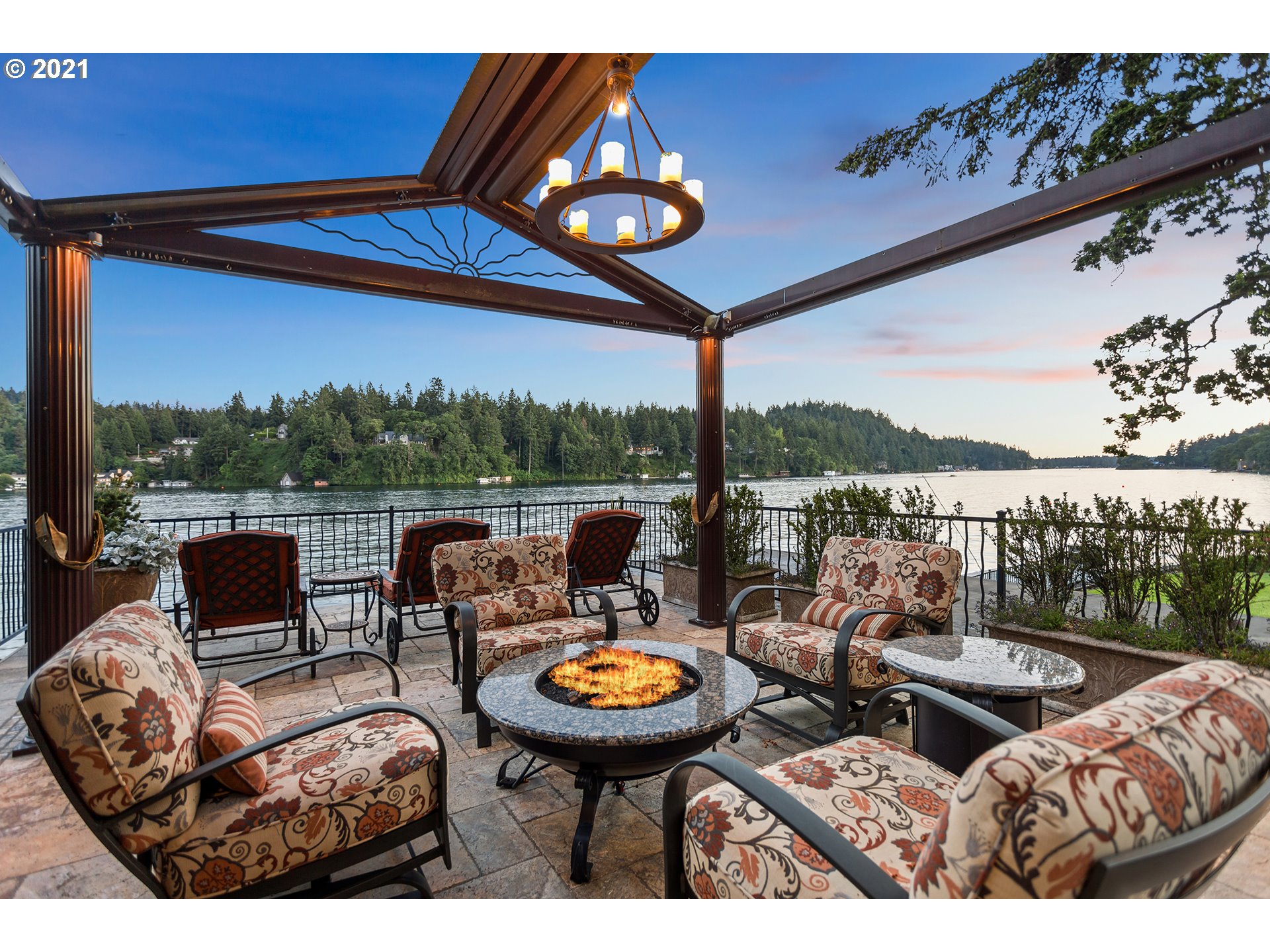 1226 Northshore Road Lake Oswego, OR 97034 - Photo 3 of 32 a view of a balcony with couches and wooden floor