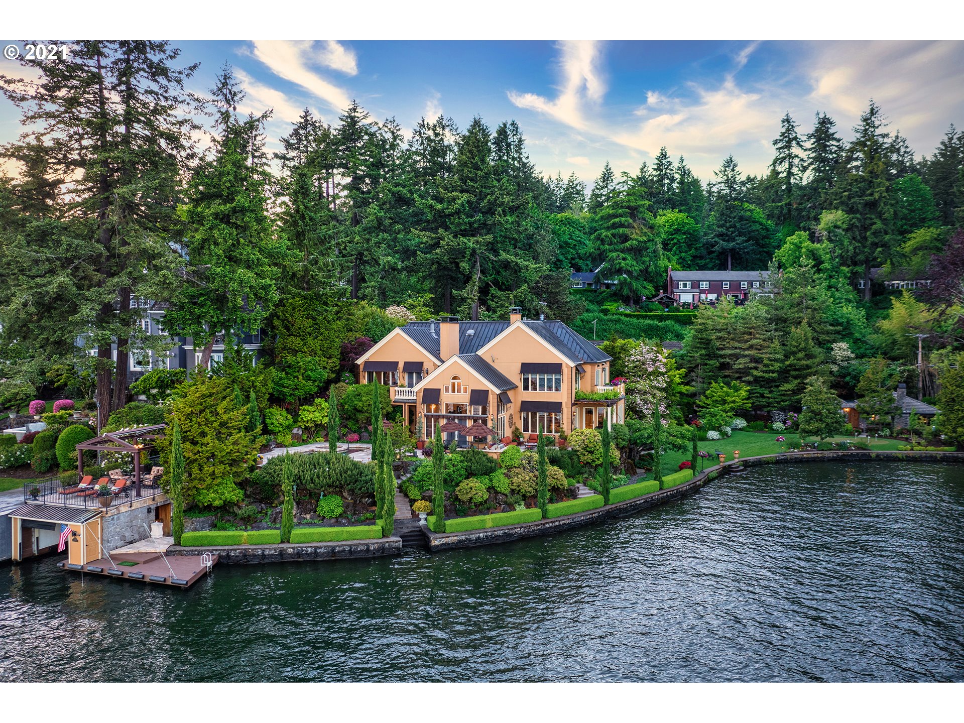1226 Northshore Road Lake Oswego, OR 97034 - Photo 24 of 32 a view of a garden with a house in the background