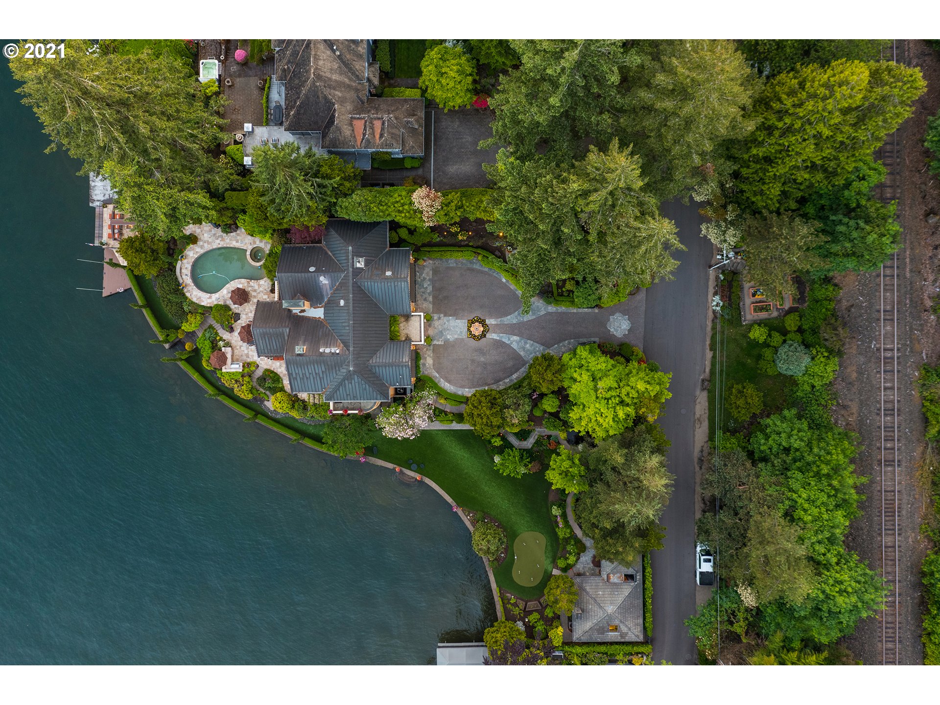 1226 Northshore Road Lake Oswego, OR 97034 - Photo 32 of 32 view of a house with a yard and sitting area