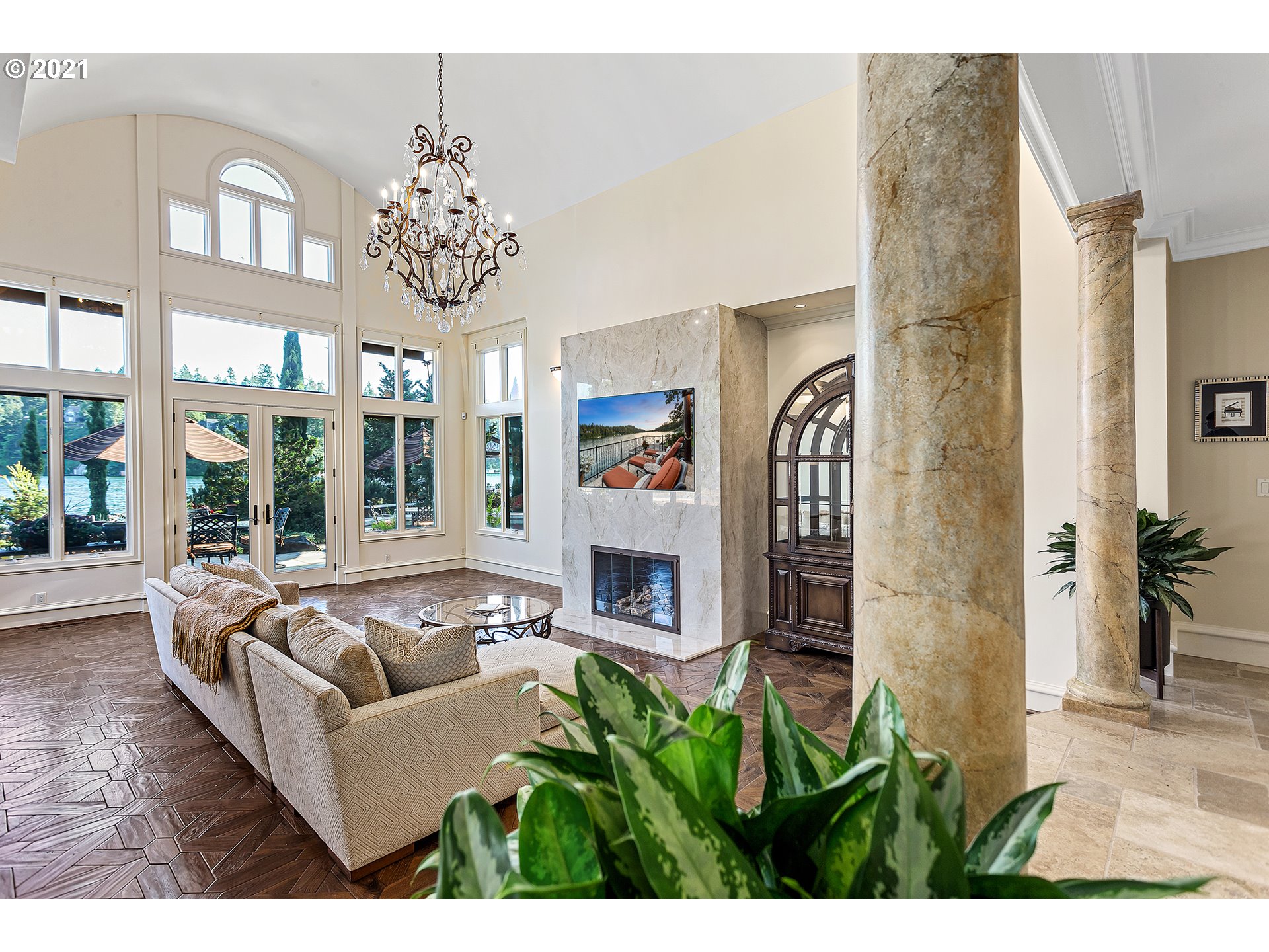 1226 Northshore Road Lake Oswego, OR 97034 - Photo 6 of 32 a living room with fireplace furniture and a chandelier