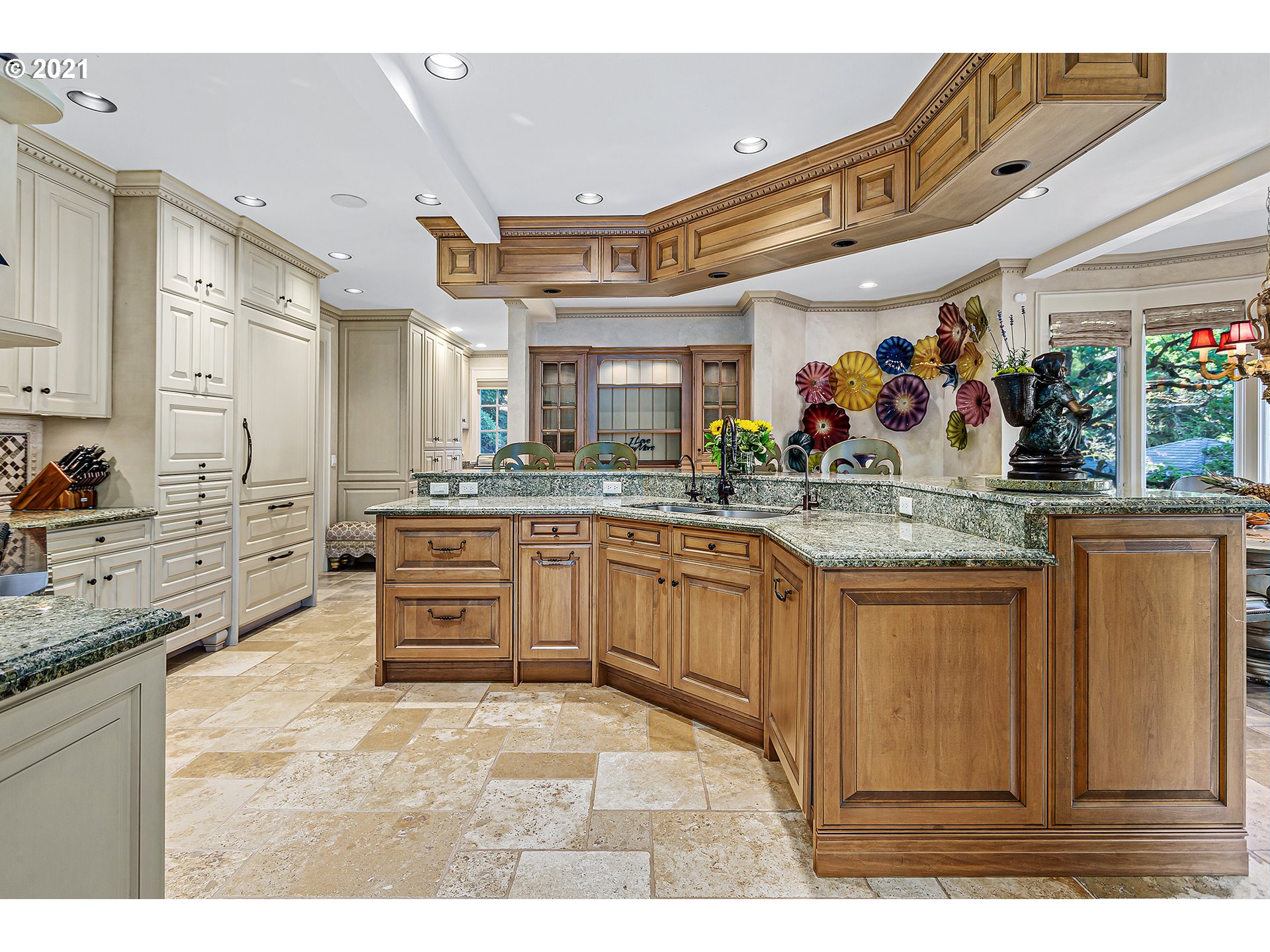 1226 Northshore Road Lake Oswego, OR 97034 - Photo 8 of 32 a kitchen with stainless steel appliances kitchen island granite countertop a sink and cabinets