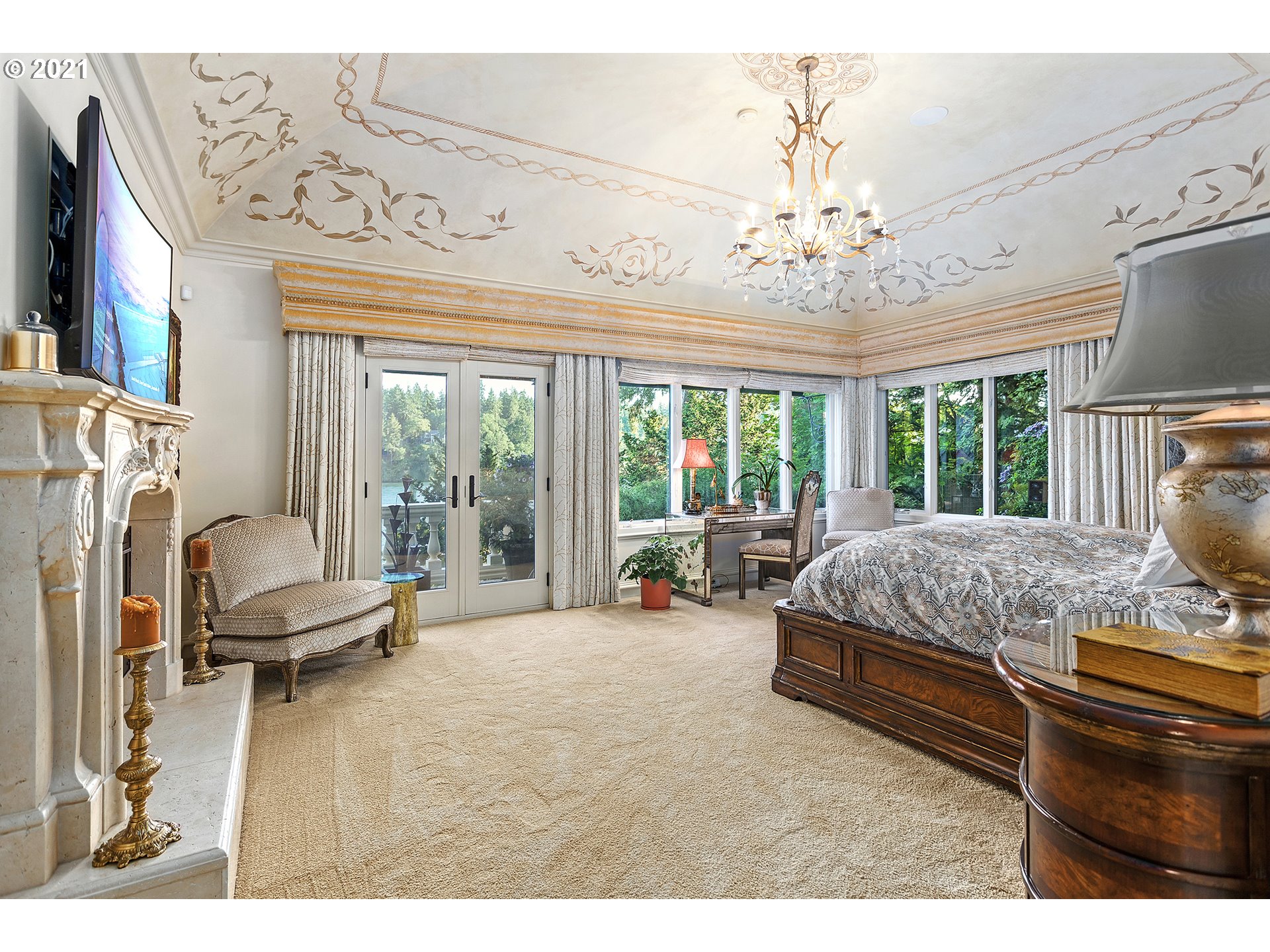 1226 Northshore Road Lake Oswego, OR 97034 - Photo 10 of 32 a living room with furniture and a chandelier