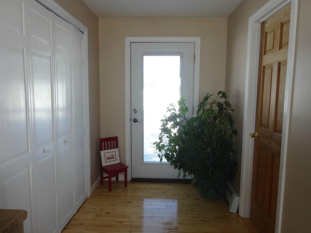 270 Coles Corner Road Winterport, ME 04496 - Photo 23 of 35 This quaint hallway houses the...