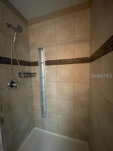 1032 Laurel Ridge Lane Sanford, FL 32773 - Photo 11 of 20 a bathroom with a shower