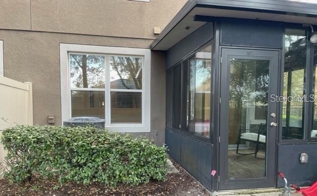1032 Laurel Ridge Lane Sanford, FL 32773 - Photo 19 of 20 a front view of a house with a glass door