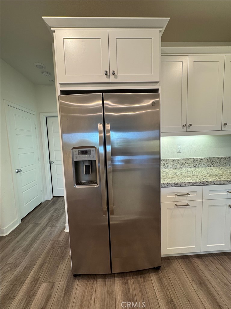 2626 Glamis Court Arcadia, CA 91007 - Photo 17 of 68 a close view of a refrigerator in kitchen and white cabinets