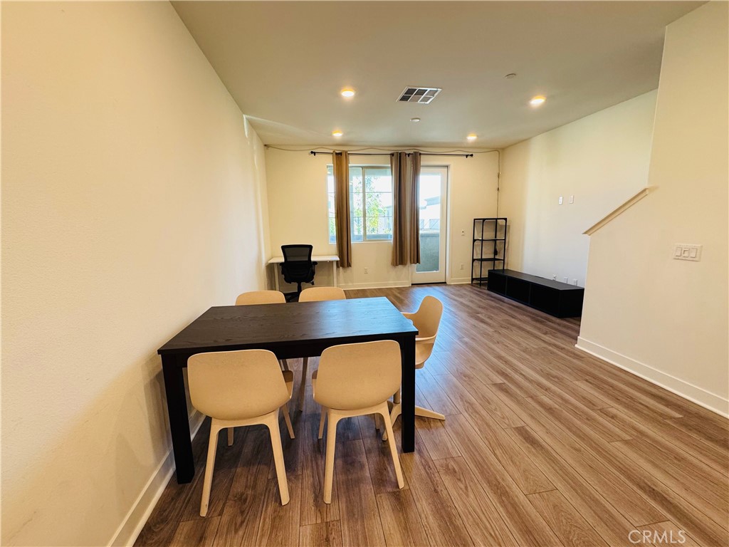 2626 Glamis Court Arcadia, CA 91007 - Photo 18 of 68 a view of a dining room with furniture and wooden floor