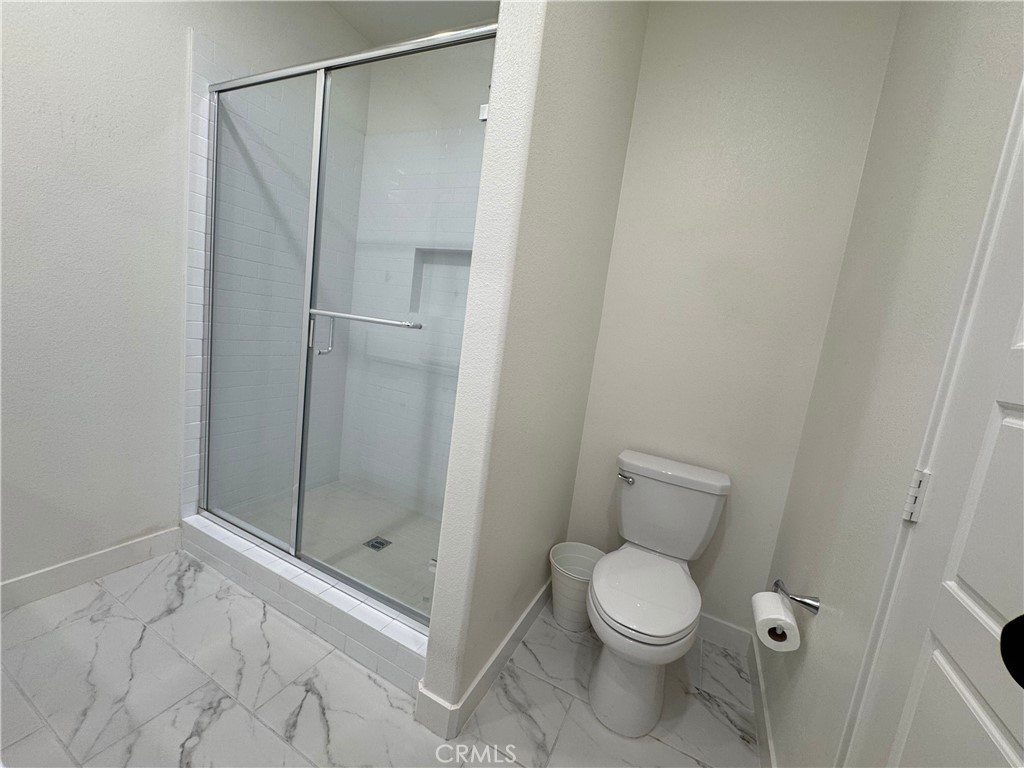 2626 Glamis Court Arcadia, CA 91007 - Photo 41 of 68 a bathroom with a toilet and a shower