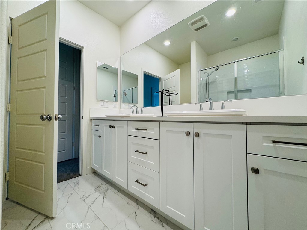 2626 Glamis Court Arcadia, CA 91007 - Photo 42 of 68 a bathroom with a sink and a mirror