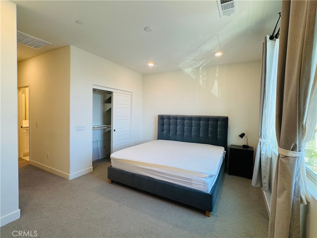 2626 Glamis Court Arcadia, CA 91007 - Photo 43 of 68 a bathroom with a bed and a walk in closet