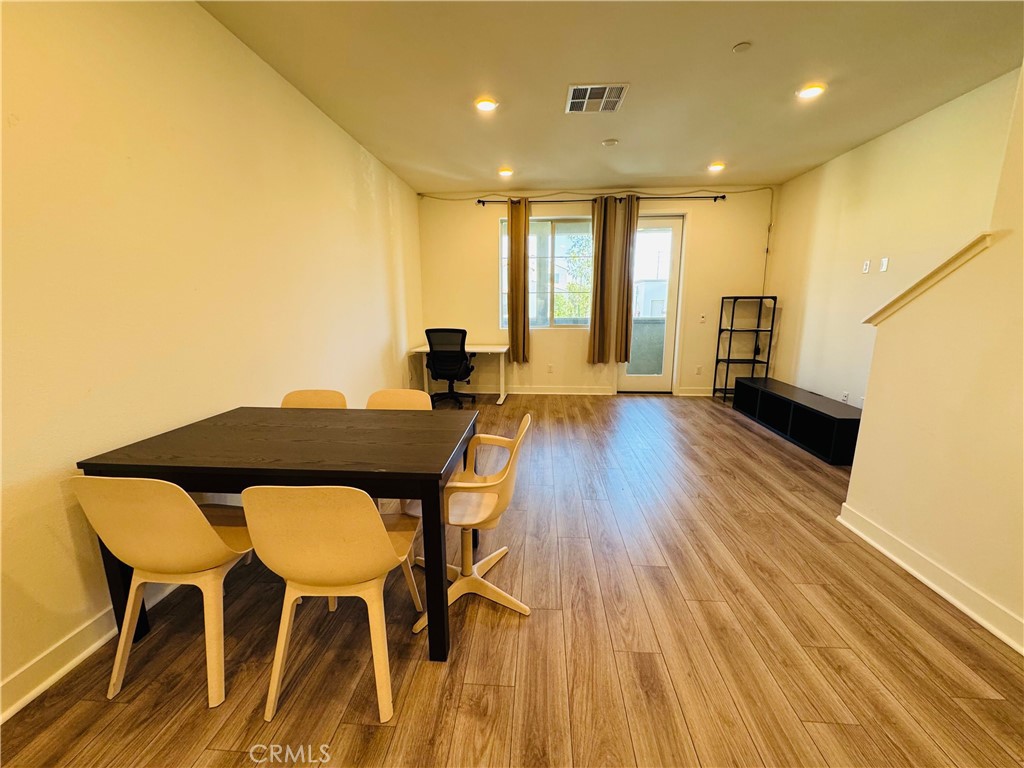 2626 Glamis Court Arcadia, CA 91007 - Photo 51 of 68 a view of a dining room with furniture and wooden floor