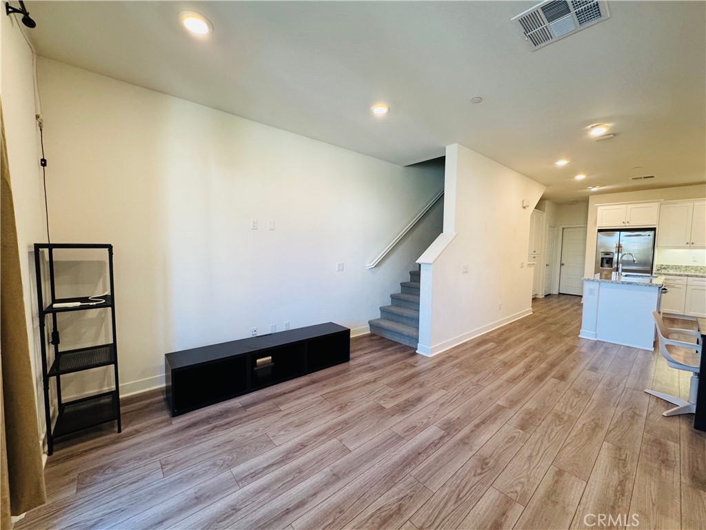 2626 Glamis Court Arcadia, CA 91007 - Photo 52 of 68 an empty room with wooden floor and entrance