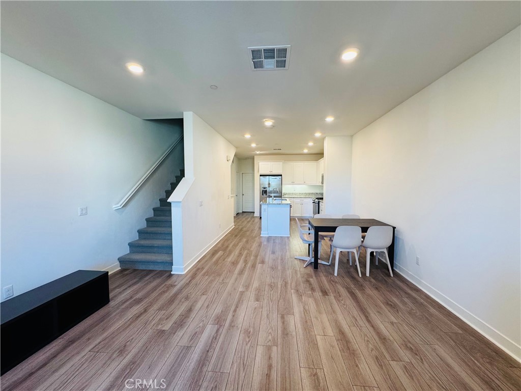 2626 Glamis Court Arcadia, CA 91007 - Photo 53 of 68 a view of a dining room with furniture and wooden floor