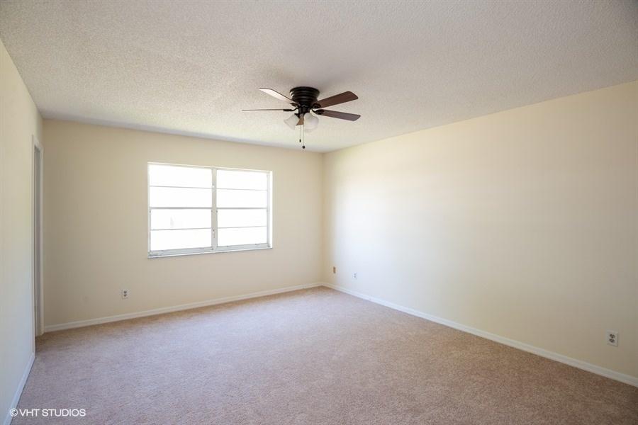 9013 Southeast Hobe Ridge Avenue Hobe Sound, FL 33455 - Photo 13 of 26 Master bedroom