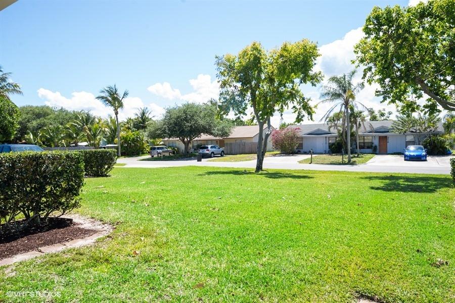 9013 Southeast Hobe Ridge Avenue Hobe Sound, FL 33455 - Photo 3 of 26 Front of building