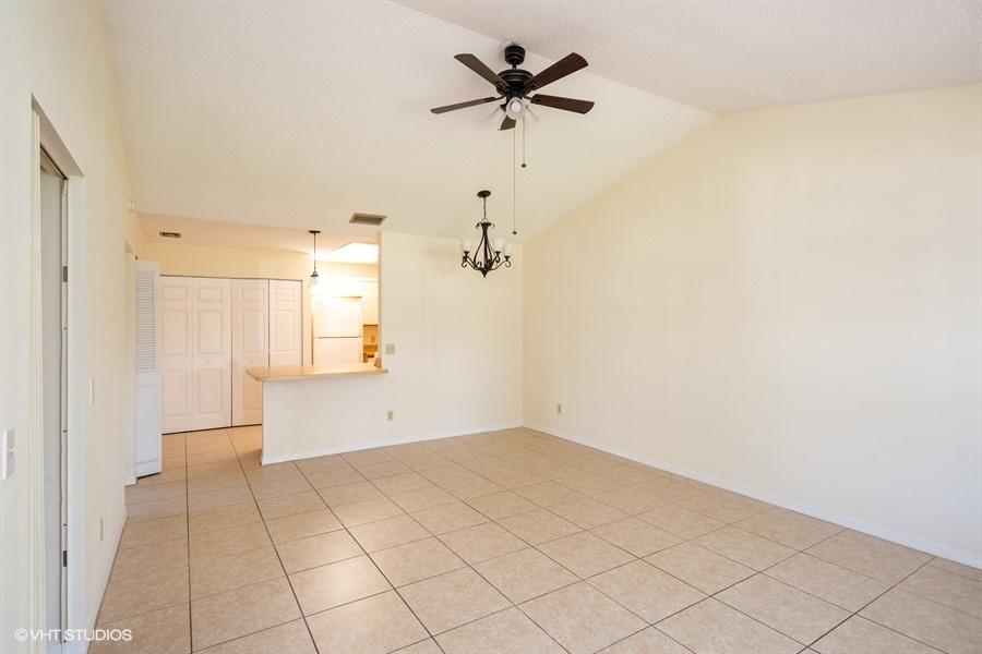 9013 Southeast Hobe Ridge Avenue Hobe Sound, FL 33455 - Photo 6 of 26 Living room and dining area