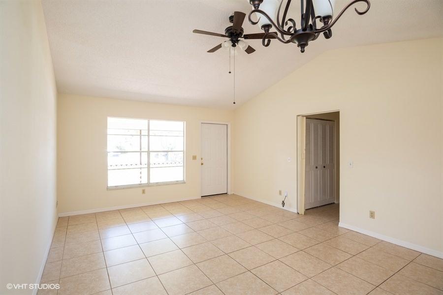 9013 Southeast Hobe Ridge Avenue Hobe Sound, FL 33455 - Photo 8 of 26 Living room and dining area