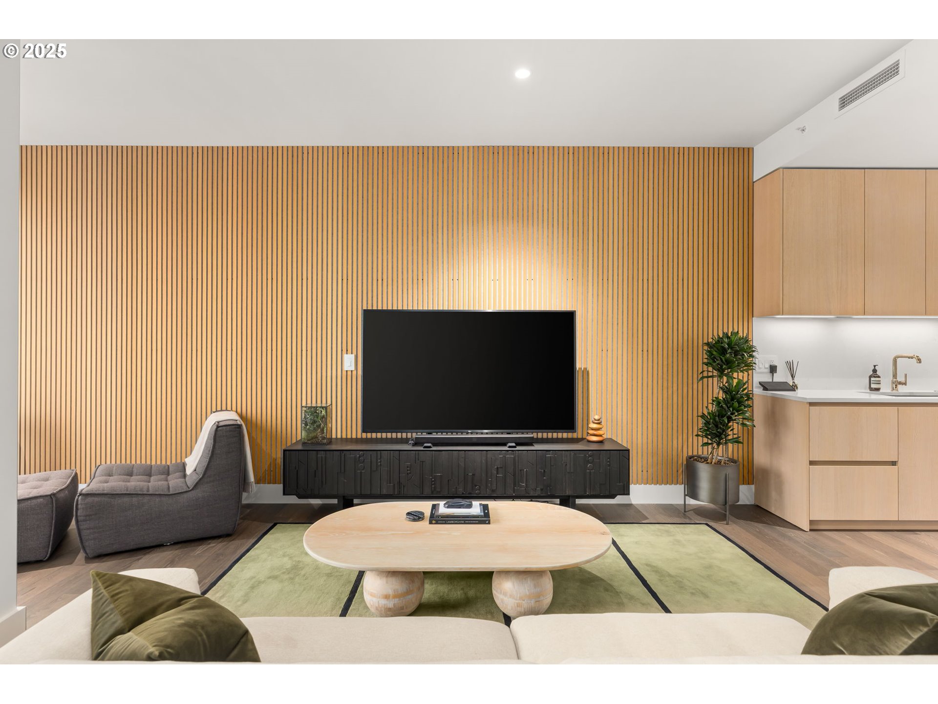 550 Southwest 10th Avenue, Unit 3003 Portland, OR 97205 - Photo 2 of 44 a living room with furniture and a flat screen tv