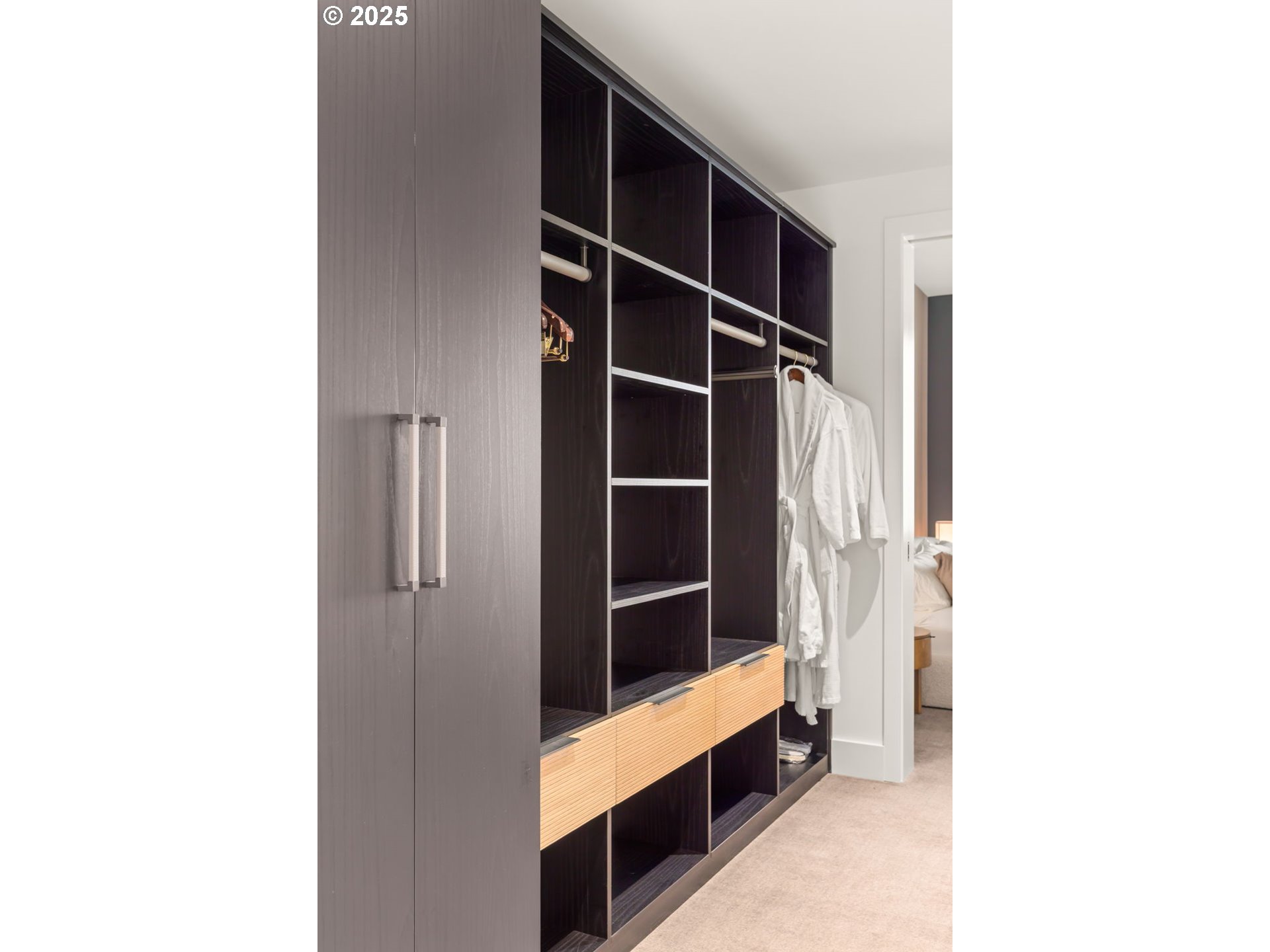 550 Southwest 10th Avenue, Unit 3003 Portland, OR 97205 - Photo 21 of 44 a view of walk in closet with clothes and shoes