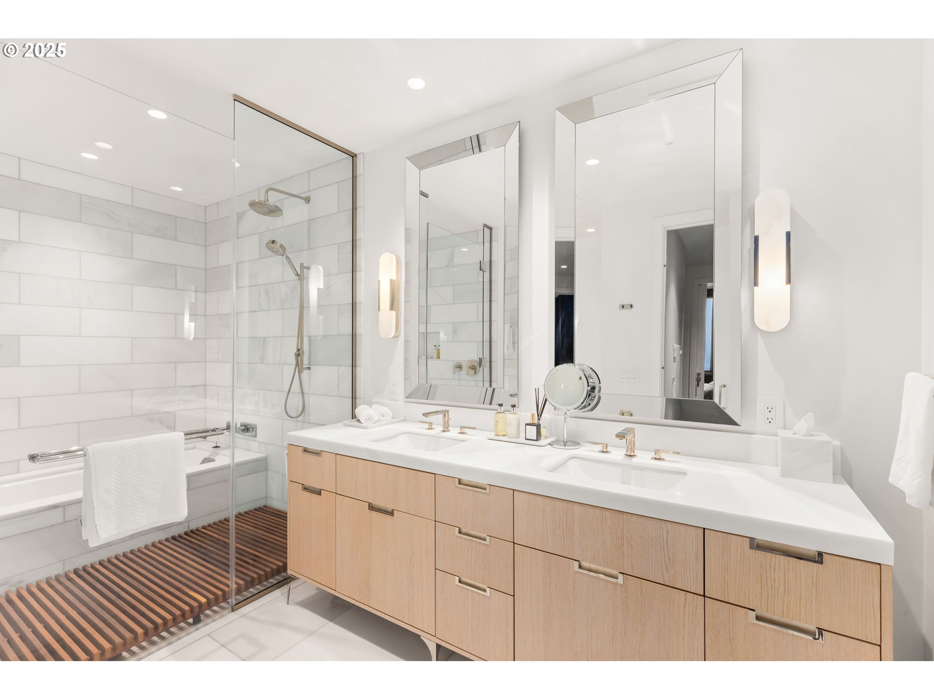 550 Southwest 10th Avenue, Unit 3003 Portland, OR 97205 - Photo 22 of 44 a bathroom with a double vanity sink mirror double and bathtub