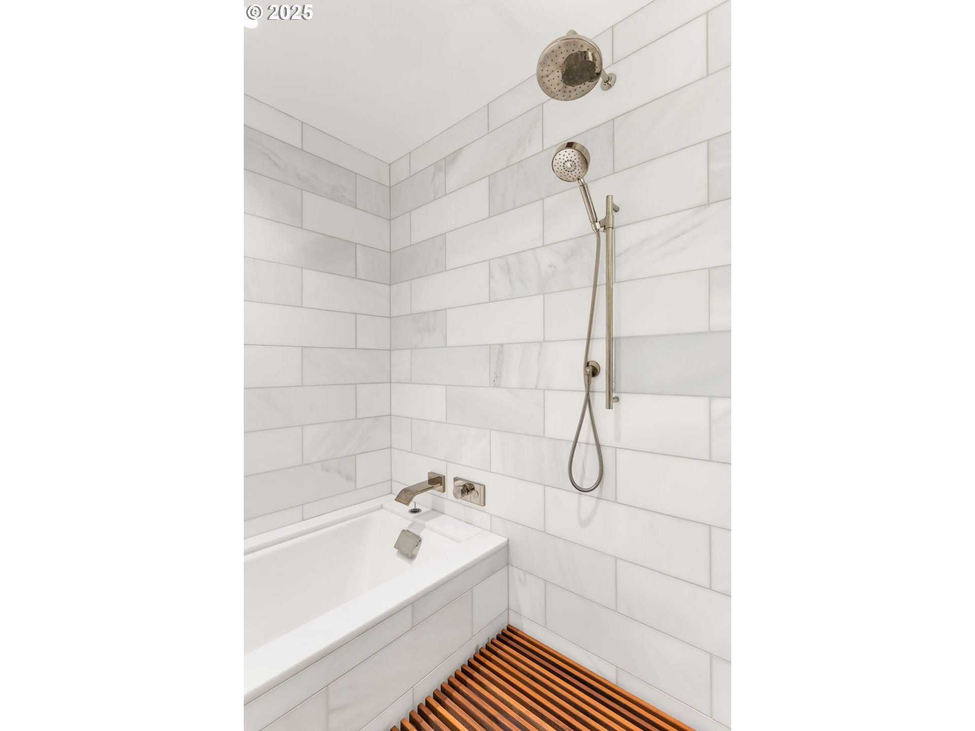 550 Southwest 10th Avenue, Unit 3003 Portland, OR 97205 - Photo 25 of 44 a bathroom with a bathtub and shower