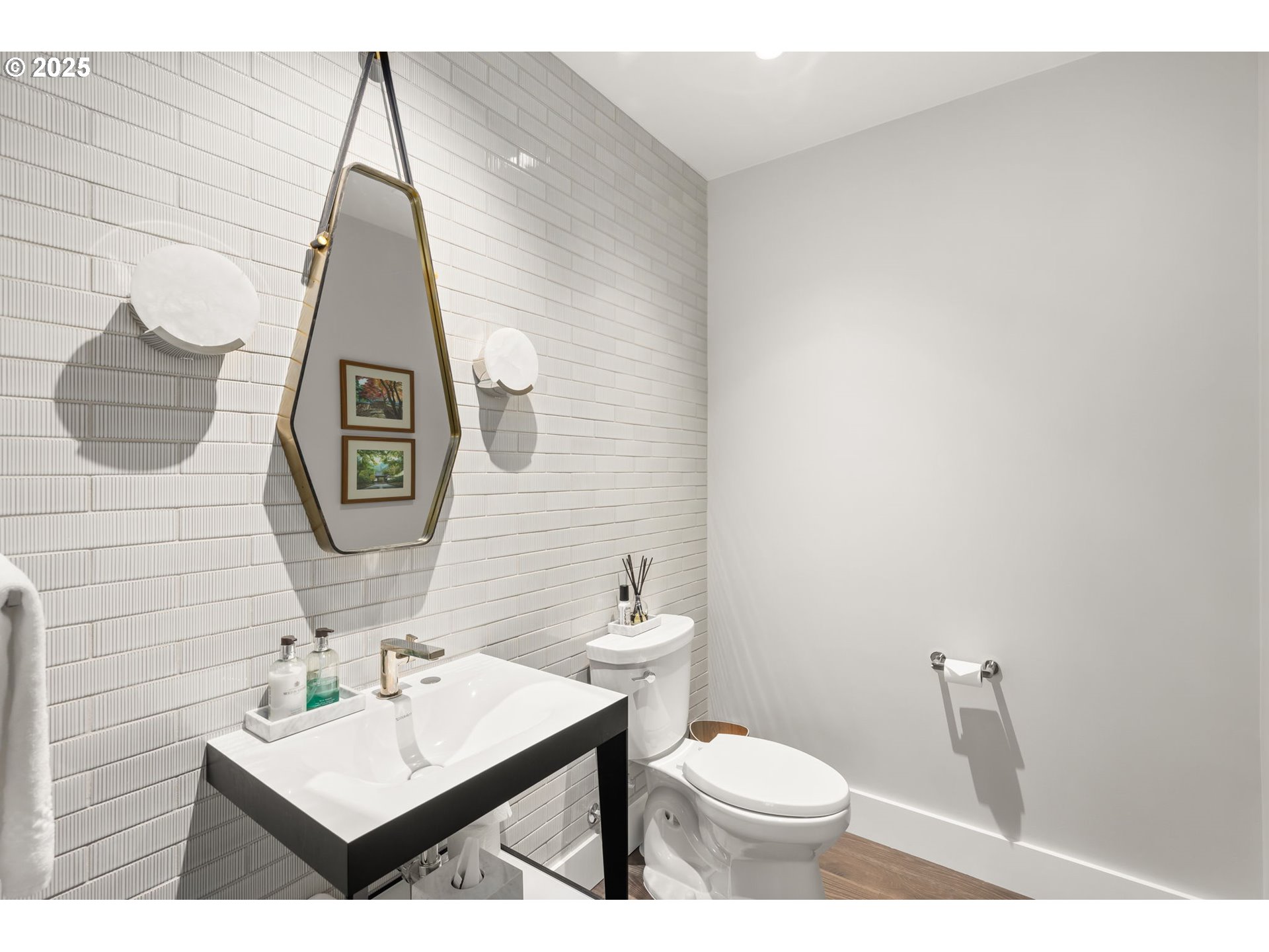 550 Southwest 10th Avenue, Unit 3003 Portland, OR 97205 - Photo 27 of 44 a bathroom with a toilet sink and mirror