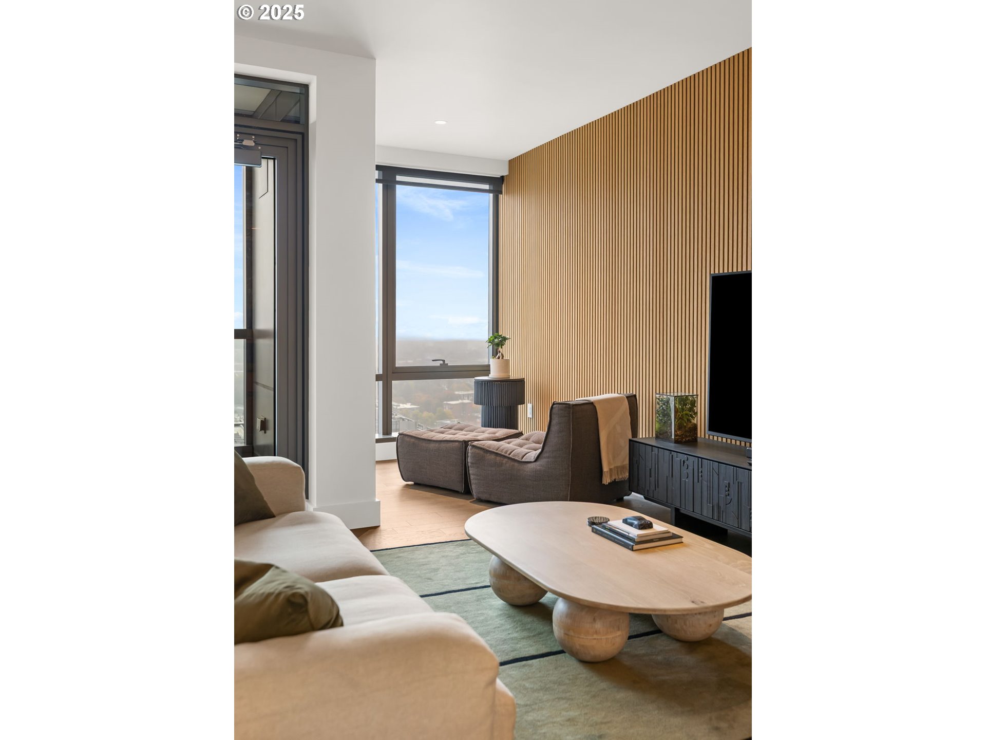 550 Southwest 10th Avenue, Unit 3003 Portland, OR 97205 - Photo 34 of 44 a living room with furniture and a large window