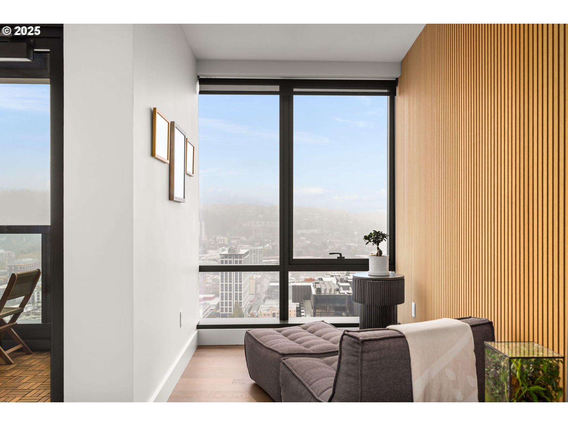 550 Southwest 10th Avenue, Unit 3003 Portland, OR 97205 - Photo 35 of 44 a view of a living room with furniture and window